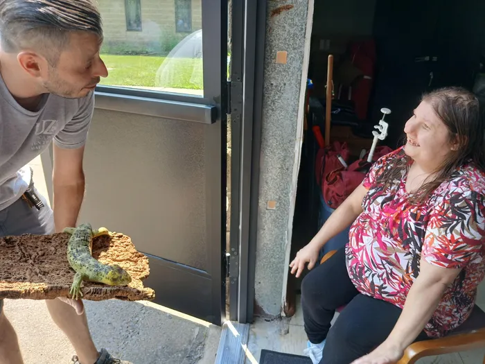 Arc Otsego staff member sharing an animal encounter with a program participant