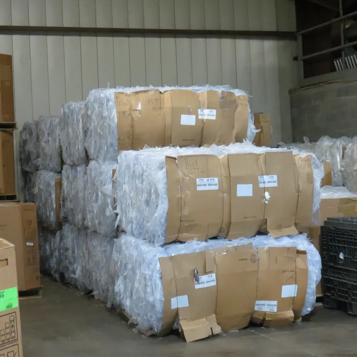 Creekside Industries warehouse floor stacked with baled materials